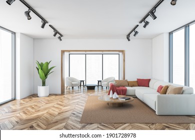 White Living Room With Corner Sofa And Furniture, Parquet Floor And Carpet, Lamps. Open Space Living Room With Armchairs And Coffee Table, 3D Rendering No People