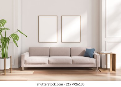 White Living Room Interior With Sofa, Coffee Table With Books, Plant In Pot On Hardwood Floor. Two Mock Up Canvas Posters. 3D Rendering