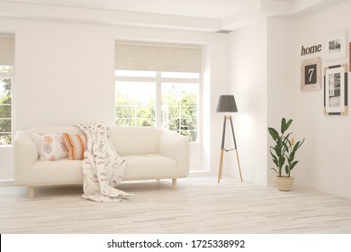 White Living Room With Sofa And Summer Landscape In Window. Scandinavian Interior Design. 3D Illustration