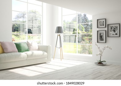 White Living Room With Sofa And Summer Landscape In Window. Scandinavian Interior Design. 3D Illustration