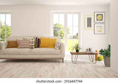 White living room with sofa and summer landscape in window. Scandinavian interior design. 3D illustration - Shutterstock ID 1916447744