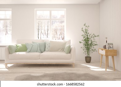 White living room with sofa and winter landscape in window. Scandinavian interior design. 3D illustration - Shutterstock ID 1668582562