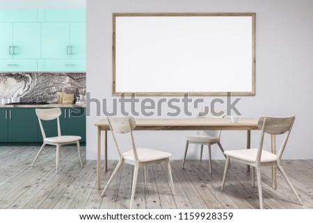 White and marble wall kitchen interior with a wooden floor, green closets and countertops, and a horizontal poster frame. A table with chairs. 3d rendering mock up