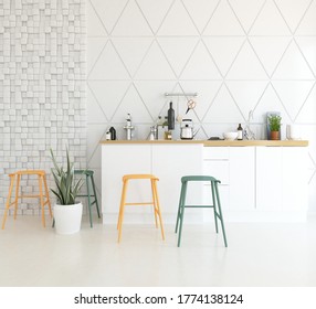 White Minimalist Kitchen Room Interior With Dinning Furniture On A Wooden Floor, Decor On A Large Wall, White Landscape In Window. Home Nordic Interior. 3D Illustration