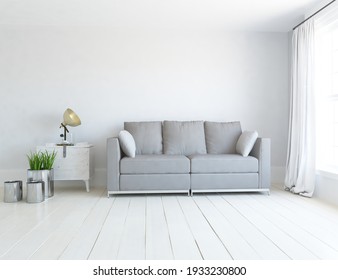 White Minimalist Living Room Interior With Sofa On A Wooden Floor, Decor On A Large Wall, White Landscape In Window. Home Nordic Interior. 3D Illustration