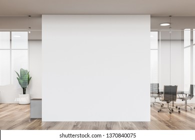 White Modern Office Interior With Glass Walls, Wooden Floor, Long Black Meeting Room Table With Metal Chairs And White Mock Up Wall In The Center. 3d Rendering