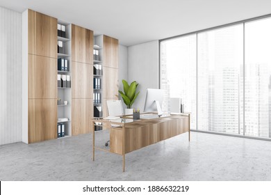 White Office Wooden Business Room With Table On Grey Marble Floor, Window And Plant, Side View. Office Room With Computer And Shelves With Papers, 3D Rendering No People