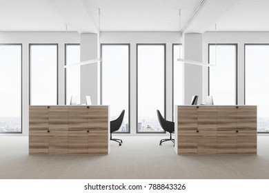 White Open Space Office Environment With A Concrete Floor, Large Windows, And Wooden Cubicles With Computer Tables. A Side View. 3d Rendering Mock Up