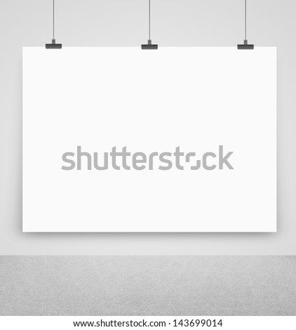 white poster on a wall