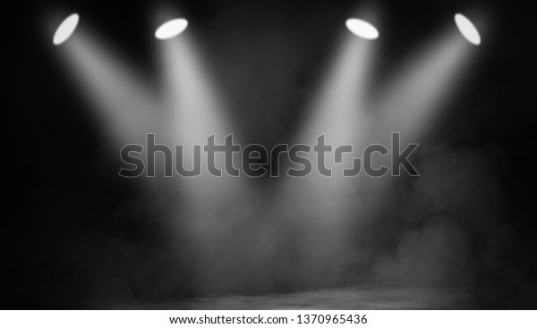 White projector. Spotlight stage with smoke on\
black background.Design\
element.