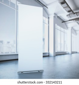 White roll up banner in a modern interior. 3d rendering