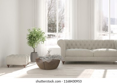 White room with sofa and winter landscape in window. Scandinavian interior design. 3D illustration - Shutterstock ID 1168430953
