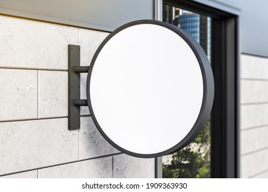 White Round Sign On Wall. Exhibition And Advertising Concept. Mock Up. 3D Rendering