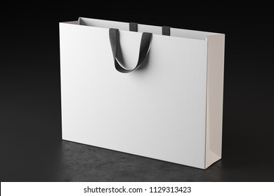 White Shopping Bag On A Dark Beton Floor. Mock Up. 3d Rendering
