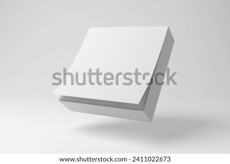 White sticky note pad floating in mid air on white background. 3D illustration of the concept of communication in the office