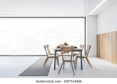 White And Wooden Dining Room With Wooden Chairs And Table Near Window, Side View. Eating Room With Minimalist Furniture On White Floor, 3D Rendering, No People