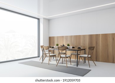 White And Wooden Dining Room With Wooden Chairs And Table Near Window, Side View. Eating Room With Minimalist Furniture On White Floor, 3D Rendering, No People