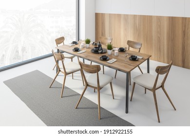 White And Wooden Dining Room With Wooden Chairs And Table Near Window, Top View. Eating Room With Minimalist Furniture On White Floor, 3D Rendering, No People
