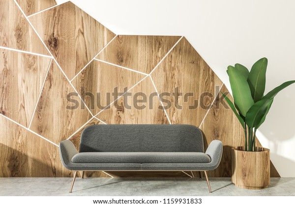 White and wooden geometric wall mural in the living room. 