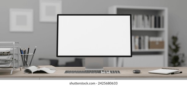 A white-screen computer mockup and office supplies on a wooden desk in a modern office. workspace front view. 3d render, 3d illustration - Powered by Shutterstock