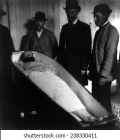 Wild West. Jesse James, dead, in coffin, ca. 1882.