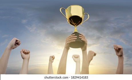Winning team is holding trophy in hands. 3D Render. - Shutterstock ID 1829414183