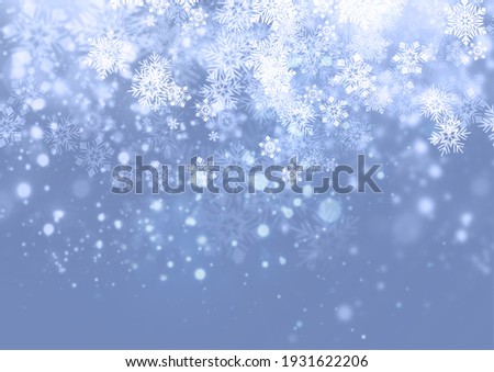 Winter background with falling snowflakes.