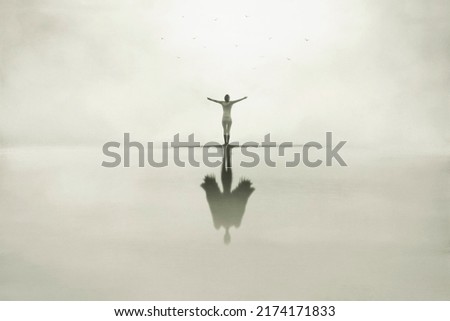 Similar – Hallig Gröde | Senior citizen stands in the calm North Sea at low tide and raises her hands to the sky