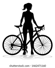 A Woman Bicycle Riding Bike Cyclist In Silhouette