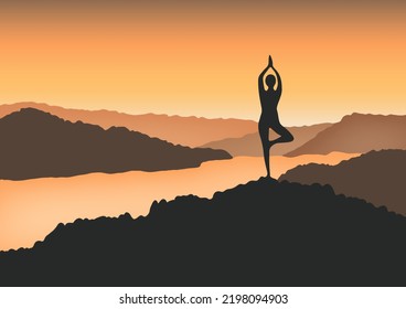 A Woman In Yoga Pose In The Mountain At Sunrise.