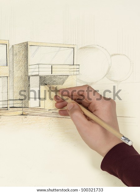 woman\'s hand drawing architectural perspective of\
modern house