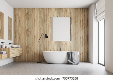 Wooden bathroom interior with a concrete floor, a large window, a double sink and a white bath tub. A framed vertical poster on the wall. 3d rendering mock up