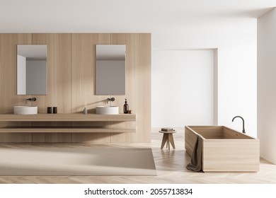 Wooden Bathroom Interior With Modern Rectangular Bathtub, Floating Vanity, Two Mirrors, Beige Rug And White Walls On Background. Parquet Style Floor. Concept Of On Trend House Design. 3d Rendering