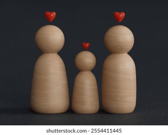 Wooden figure family happy face with heart, family home. Family relationship symbol. Insurance and property investment, homeless support, world mental health day.
 - Powered by Shutterstock