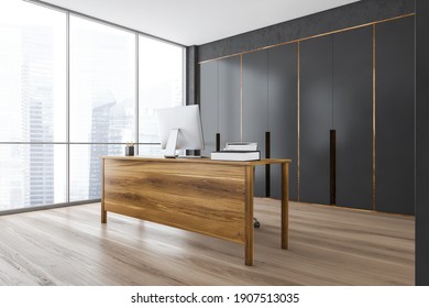 Wooden And Grey Office Cabinet With Wooden Table And Computer On Parquet Floor, Side View. Private Office Room With Furniture, 3D Rendering No People