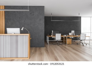 Wooden And Grey Reception Room And Open Space Office Room With Table And Computers Near Window. Reception Entrance With Office Desk, Marble Floor 3D Rendering No People