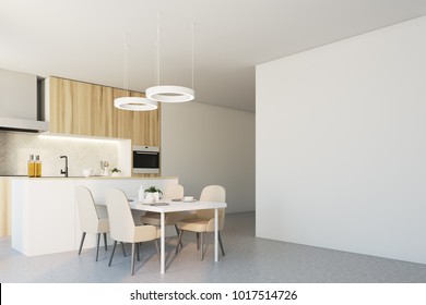 Wooden kitchen interior with wooden countertops, a concrete floor, and a white table with chairs. A side view. A blank wall. 3d rendering mock up