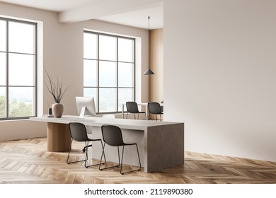 Wooden office interior with consulting workplace, pc desktop on table, hardwood floor. Meeting room with chairs, panoramic window with countryside. Copy space empty wall, 3D rendering