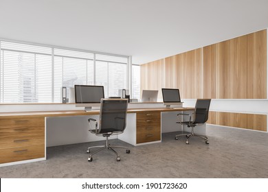 Wooden Office Room With Black Chairs, Computers On Wooden Tables, Modern Minimalist Business Office Manager Room. Office Furniture On Marble Floor, 3D Rendering No People