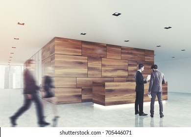 Wooden Panel And White Office Lobby With A Glass Wall Open Space Room And A Wooden Reception Counter. Close Up, Side View, People 3d Rendering Mock Up