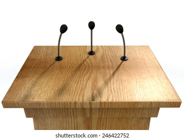 A Wooden Speech Podium With Three Small Microphones Attached On An Isolated White Studio Background