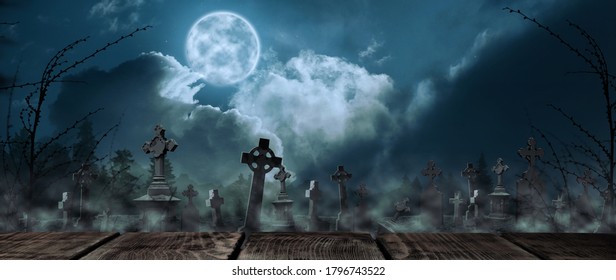 Wooden Surface And Misty Graveyard With Old Creepy Headstones Under Full Moon. Halloween Banner Design