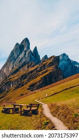 A Wooden Table And Chairs In The Mountains. 3D Illustration. Imitation Of Oil Painting.