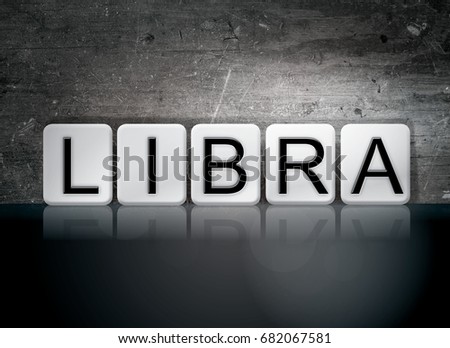 The word Libra concept and theme written in white tiles on a dark background.
