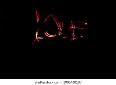 the word love made with a light source with the light painting technique