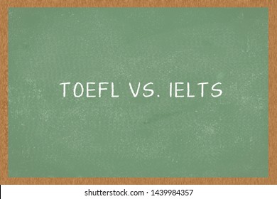 Word TOEFL Vs. IELTS , Green Chalkboard Background. Test Of English As A Foreign Language Exams