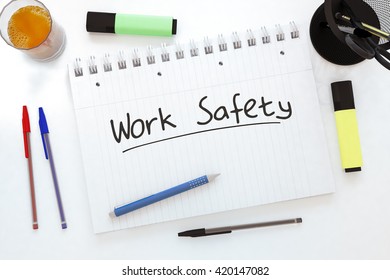 Work Safety - handwritten text in a notebook on a desk - 3d render illustration.
