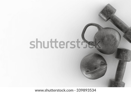 workout concept with 3d rendered kettle bell and dumbbell 