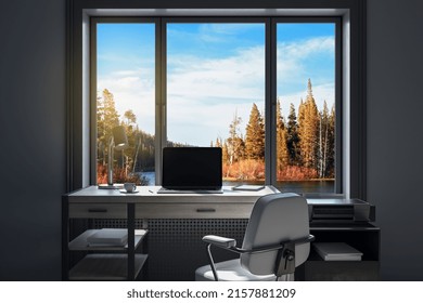 Workplace In Modern Office Interior With Blank Mock Up Laptop Computer Screen, Window With Beautiful Nature View, Coffee Cup And Other Items On Desktop, Pieces Of Furniture And Daylight. 3D Rendering