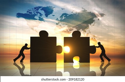 World Business teamwork puzzle pieces.